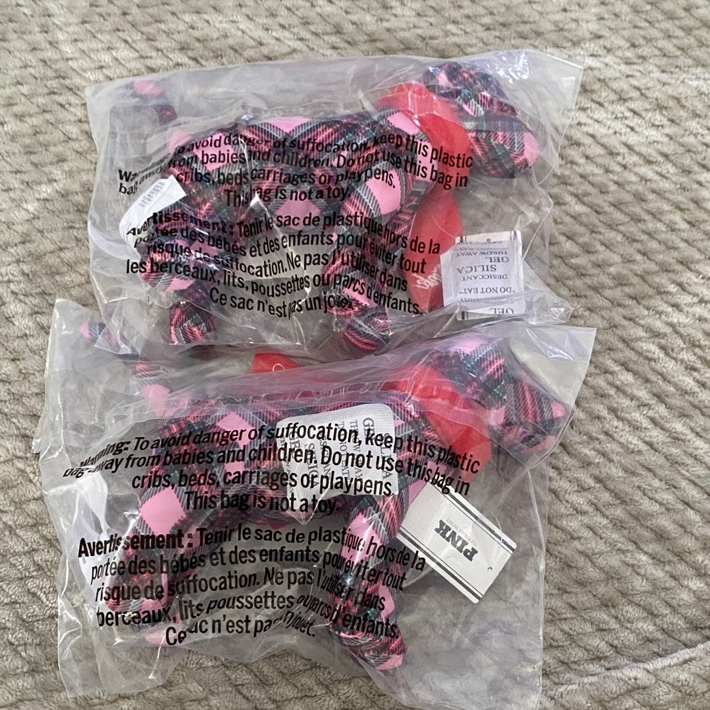 2 Victoria secret pink plaid dog with red scarf.
